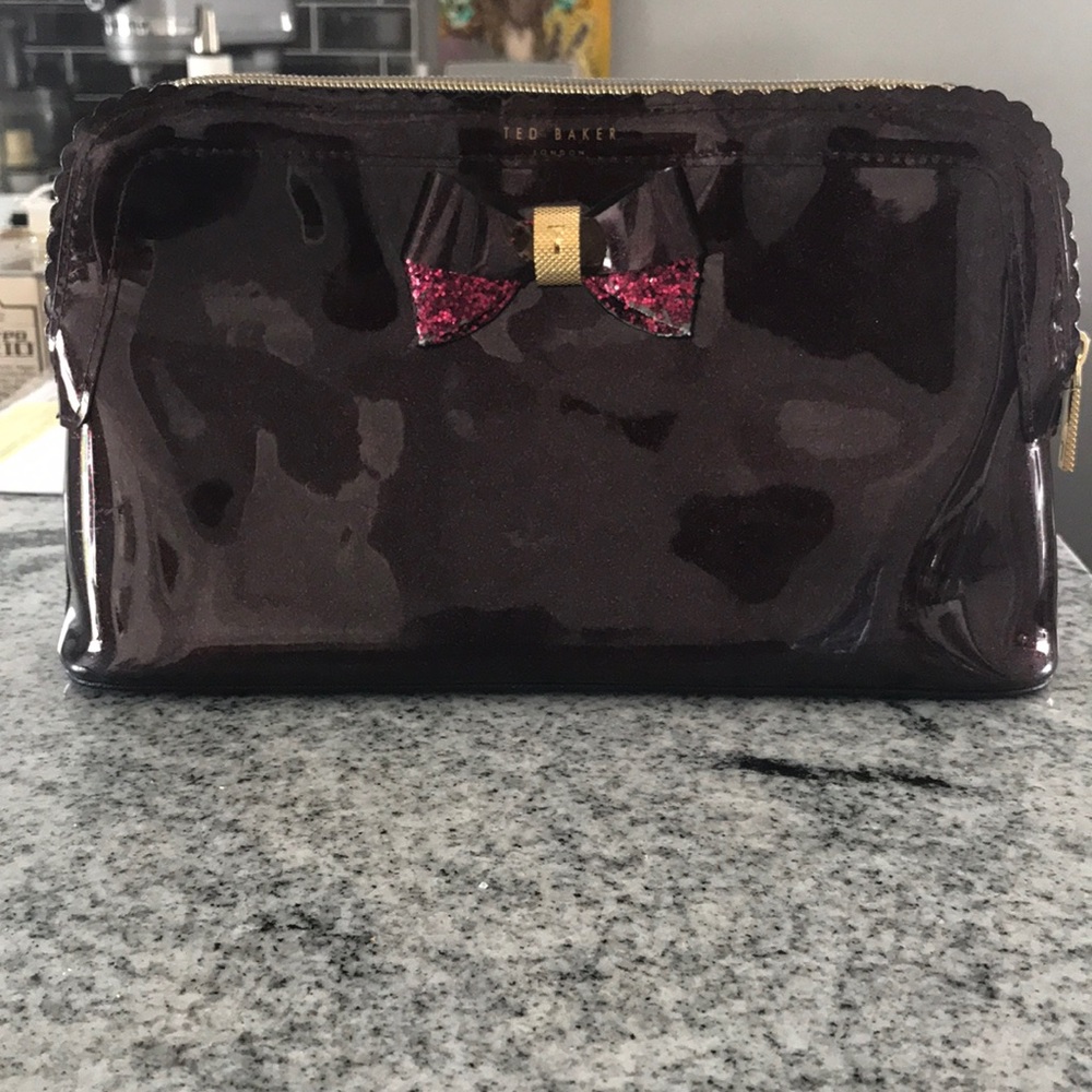 TED BAKER purple clutch w/ bow
